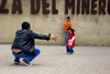 Zipaquirá, department of Cundinamarca, Colombia: a father offers his daughter a hug - Miner's square - Plaza del Minero - photo by E.Estrada