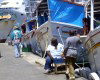 Curaao - Willemstad / CUR: heavy fisherman at the Floating Market (photo by Robert A. Ziff)