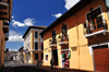 Quito, Ecuador: commerce on Calle Benalcázar - Hotel Benalcázar - looking towards Plaza San Francisco - photo by M.Torres