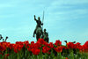 Donostia-San Sebastián, Gipuzkoa province, Euskadi: Don Quixote and Sancho ride in a field of tulips - photo by J.Zurutuza