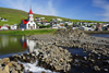 Sandavágur, Vágar island, Faroes: the village and its red roofed wooden church built in 1917 - photo by A.Ferrari