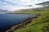 Sørvágsfjørður fjord, Vágar island, Faroes: fog frames the hills - photo by A.Ferrari
