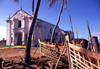 Ilha de Moçambique / Mozambique island: boat skeletons and Portuguese church of Santo António - esqueleto de barco junto à igreja de Santo António - photo by F.Rigaud
