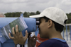 Galeta Island, Colón province, Panama: young latino boy looking thru a telescope - Smithsonian Tropical Research Institute, Galeta Point - photo by H.Olarte