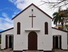 Port Mathurin, Rodrigues island, Mauritius: Catholic Church - white façade with cross - photo by M.Torres