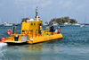 Gustavia, St. Barts / Saint-Barthélemy: the Yellow Submarine sets sail to the Marine Park of Saint Barth - semi-submersible tour ship - Les Gros Islets in the background - photo by M.Torres