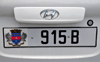 Gustavia, St. Barts / Saint-Barthélemy: car license plate - St Barts coat of arms - Maltese cross, the Fleur-de-lis, crown, pelicans, and the island's Amerindian name Ouanalao - Hyundai - photo by M.Torres