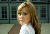close-up portrait of a young Oriental woman in a glamorous fashion pose in a city setting. Model is Malibu Stacy of Vancouver, BC, Canada. Photographed at False Creek, Vancouver, BC, Canada. Model and property released - photo by D.Smith