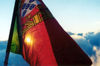East Timor - Timor Leste: dusk of the Portuguese empire - flag - bandeira Portuguesa (photo by Mário Tomé)