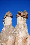 Cappadocia - Göreme, Nevsehir province, Central Anatolia, Turkey: fairy chimneys - hard rocks resting on cone-shaped pinnacles - Valley of the Monks - Pasabagi Valley- photo by W.Allgöwer