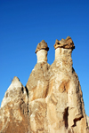 Cappadocia - Göreme, Nevsehir province, Central Anatolia, Turkey: rock formation - basalt boulders over tuff cones - fairy chimneys - Valley of the Monks - Pasabagi Valley- photo by W.Allgöwer