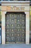 Charlotte, North Carolina, USA: SunTrust building - bas-relief decorated door - photo by M.Torres